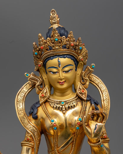 Dukar’s serene face and upper body, highlighting intricate details, sacred ornaments, and radiant gold finish.
