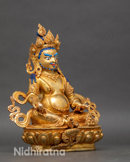 Right profile of Dzambhala statue, hand-carved copper, gold-gilded Tibetan Wealth Deity from Nepal