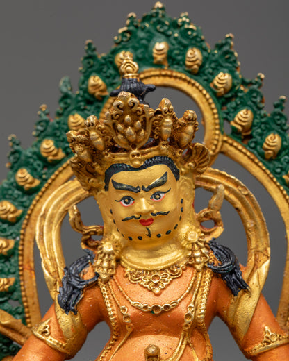 Dzambhala’s five-jeweled crown, intricate jewelry, and vibrant yellow hue with electroplated finish