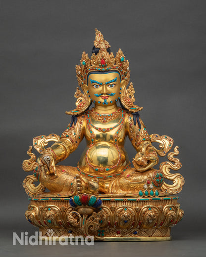 Dzambhala wealth deity statue full front view with triple gold gilding and carved copper details