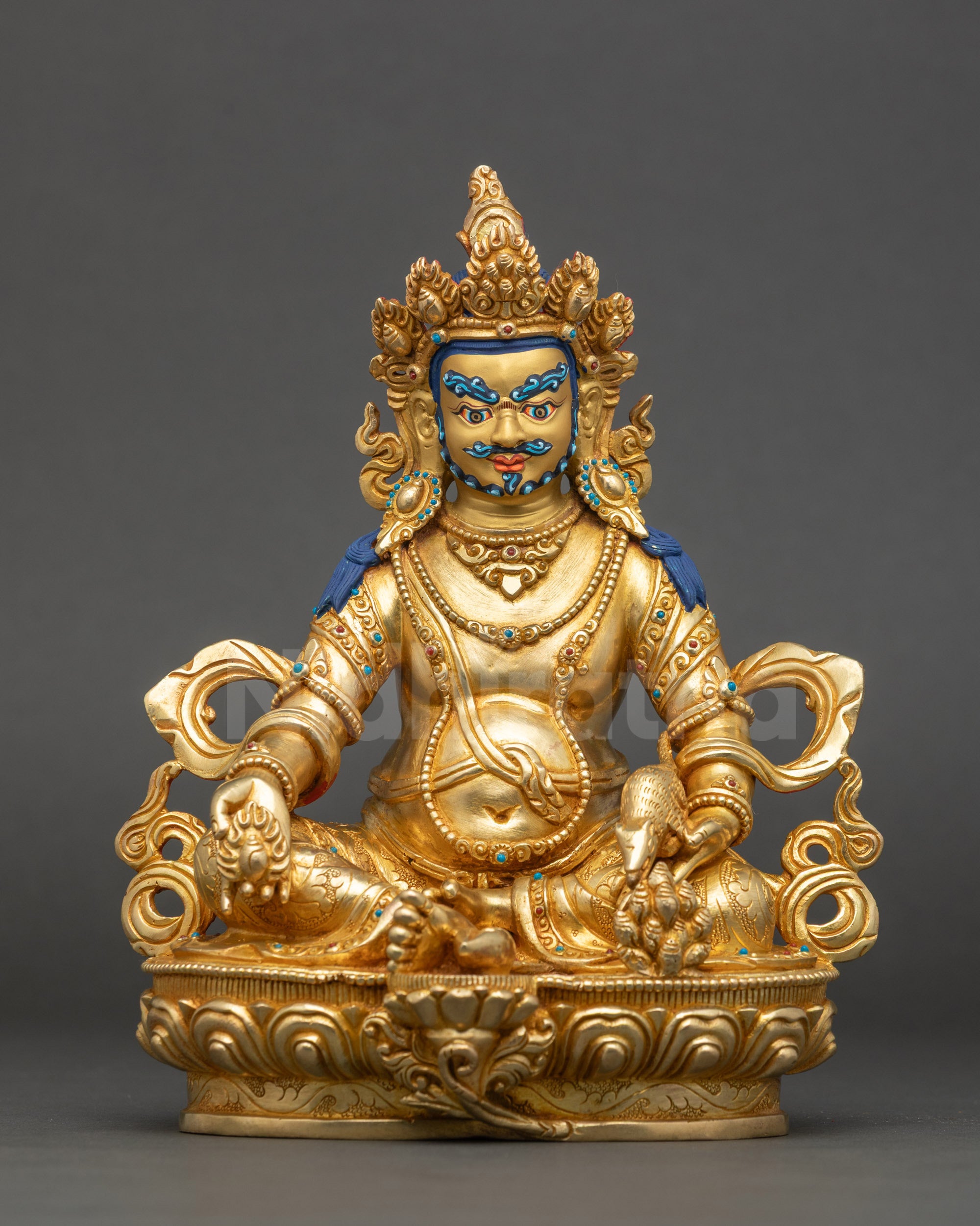 Dzambhala wealth deity statue with gold fire gilding and painted face, Nepalese art