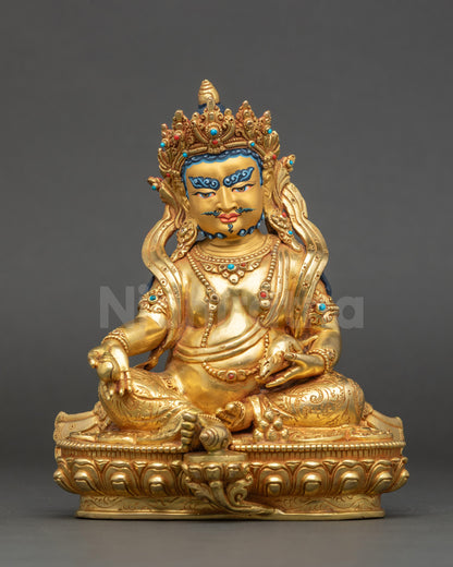 Dzambhala wealth deity statue with gold fire gilding seated on lotus throne