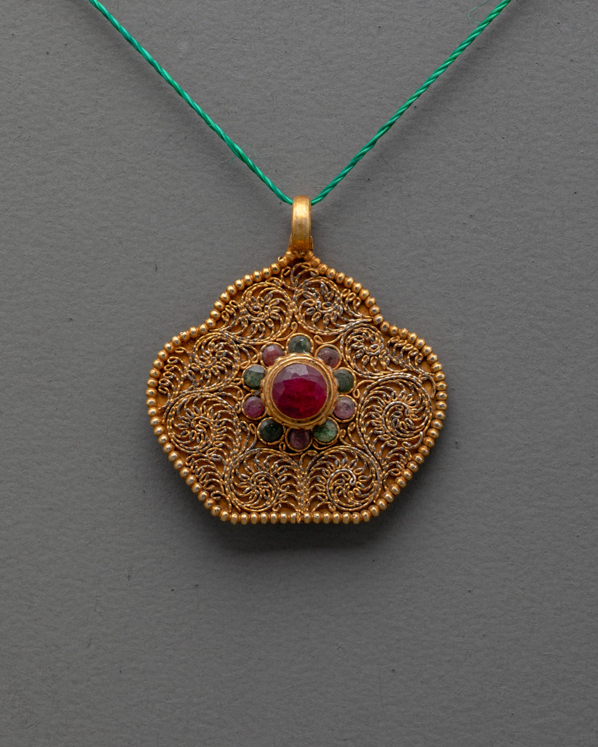 Elegant Ghau Prayer Pendant | Handcrafted Nepalese Amulet