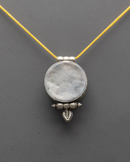Elegant Infinity Knot Locket handmade by Patan artisans, symbol of harmony and spiritual strength