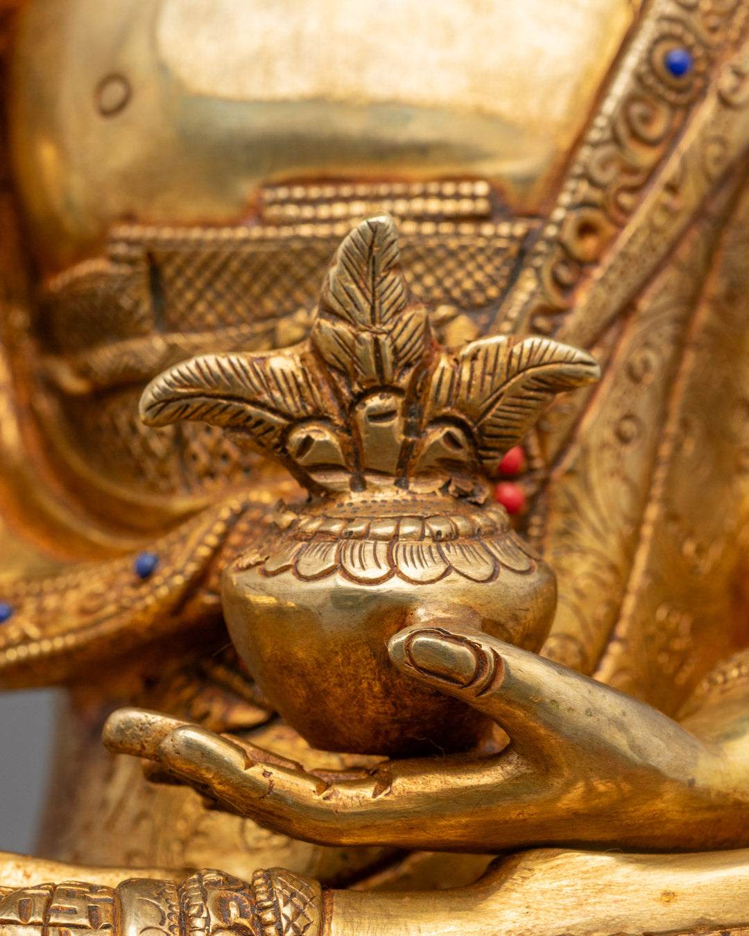 Elegant Medicine Buddha statue sitting serenely on a lotus seat