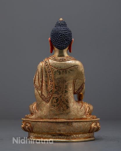 Elegant Shakyamuni Buddha statue with radiant gold finish and intricate craftsmanship, perfect for Buddhist altar or meditation space