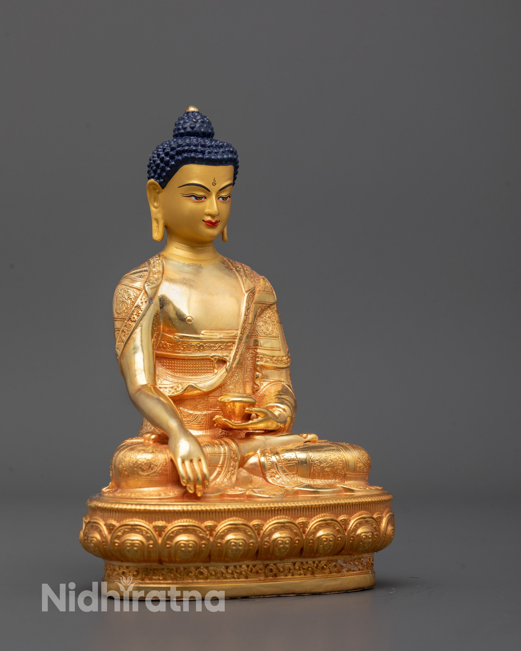 Elegant profile view of the Shakyamuni Buddha Statue highlighting the fine detailing of robes