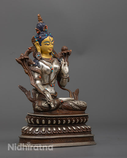 Exquisite Nepalese White Tara sculpture featuring enlightened femininity and detailed lotus base
