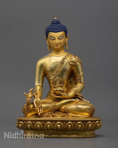 Exquisitely handcrafted Medicine Buddha Statue made from 24K gold-gilded copper, featuring intricate details and symbols of healing, wisdom, and balance.