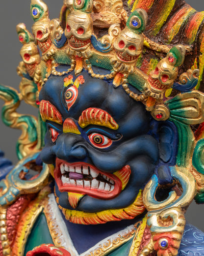 Close-up of Mahakala Bernagchen wrathful face with blazing halo
