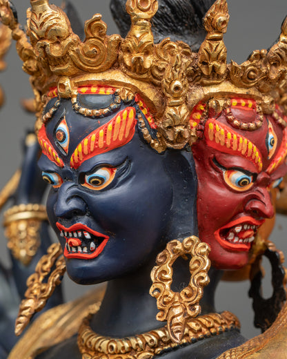 Side close-up of Kalachakra statue highlighting ritual attributes and lotus seat