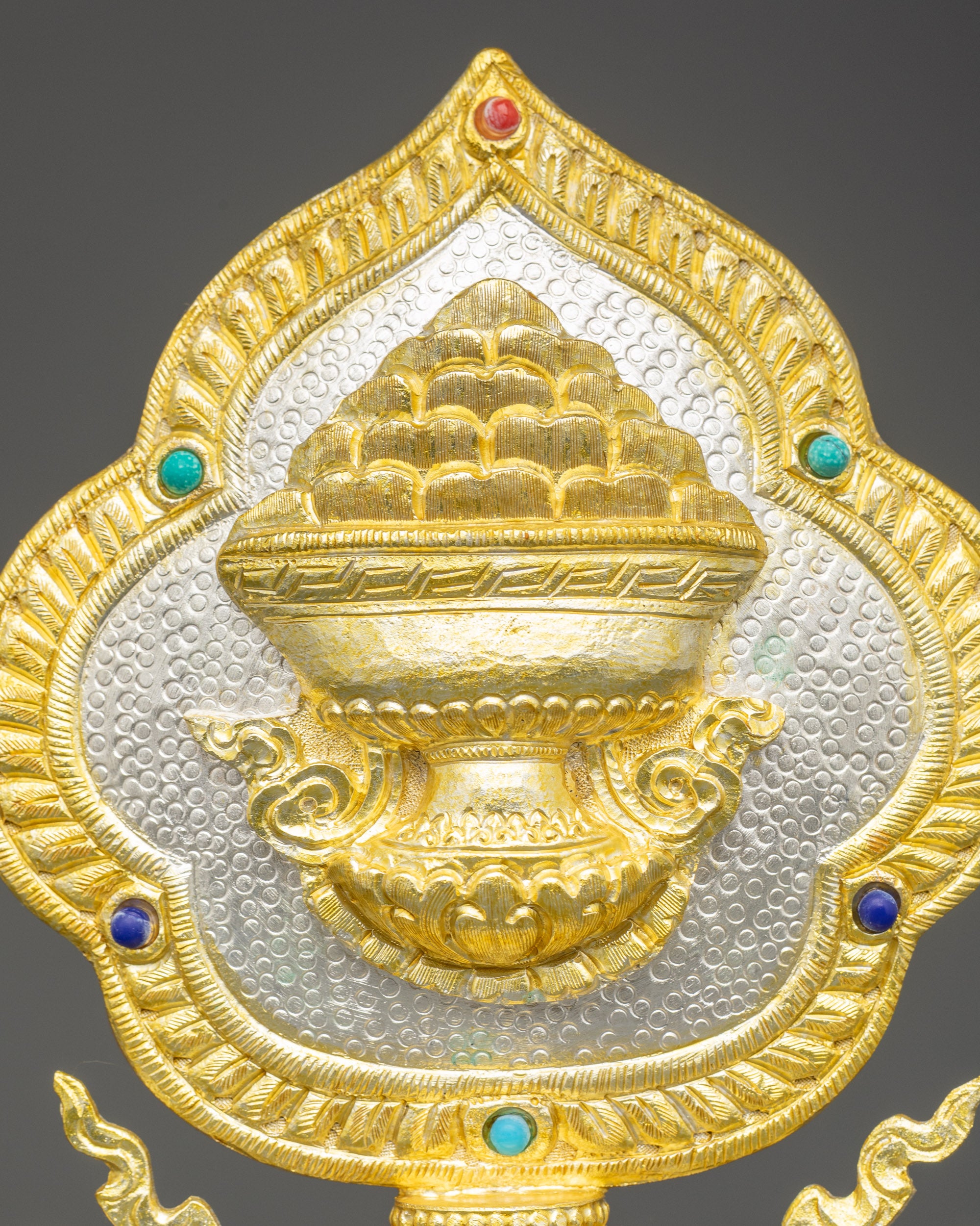 Astamangala symbols adorned with turquoise, coral, and lapis lazuli stones