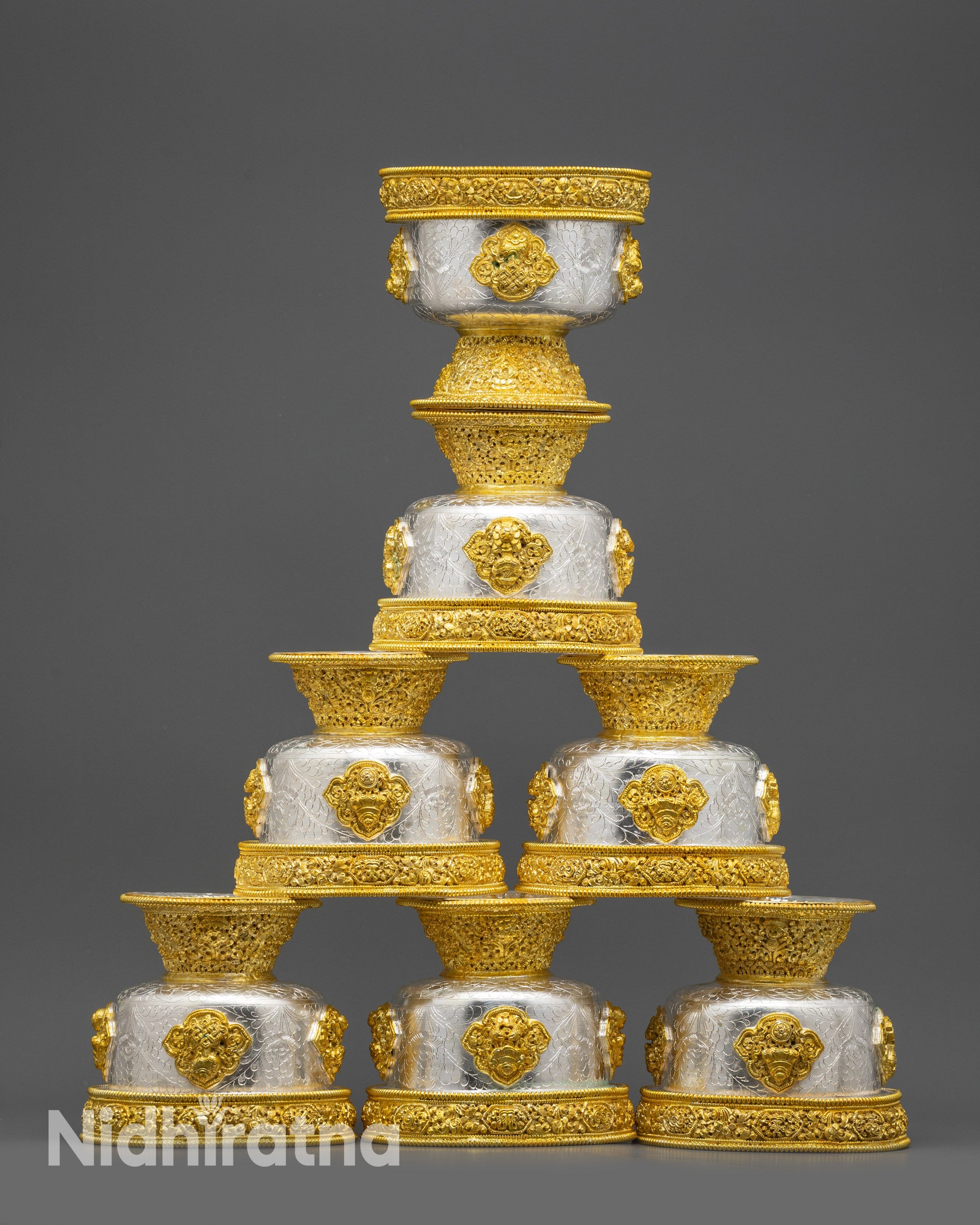 Close up of deity inside the Water Offering Bowl, intricate gold & silver details