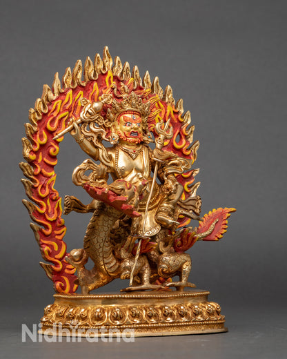 Side view of White Dzambhala altar sculpture with skull crown, flowing robes, and halo