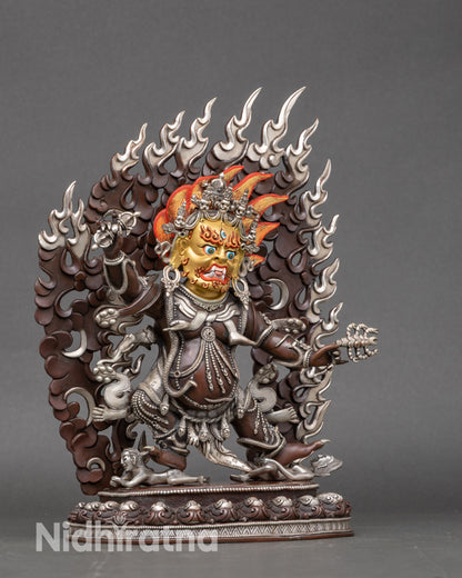 Side view of Himalayan Guru Drakpo statue subduing human figures, handcrafted by Newari artisan