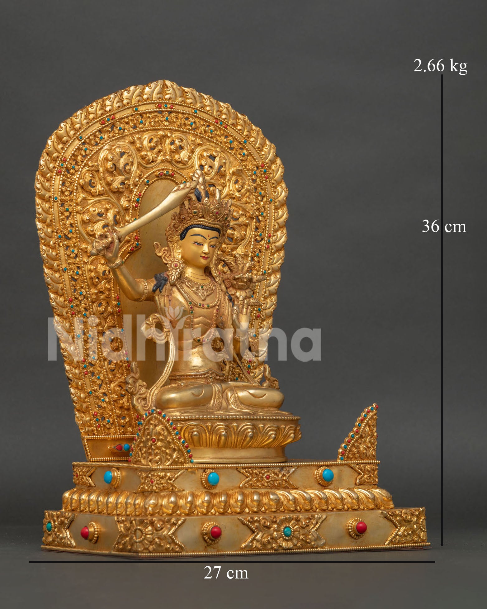 Manjushri Bodhisattva seated on lotus throne with turquoise and coral gemstone decoration