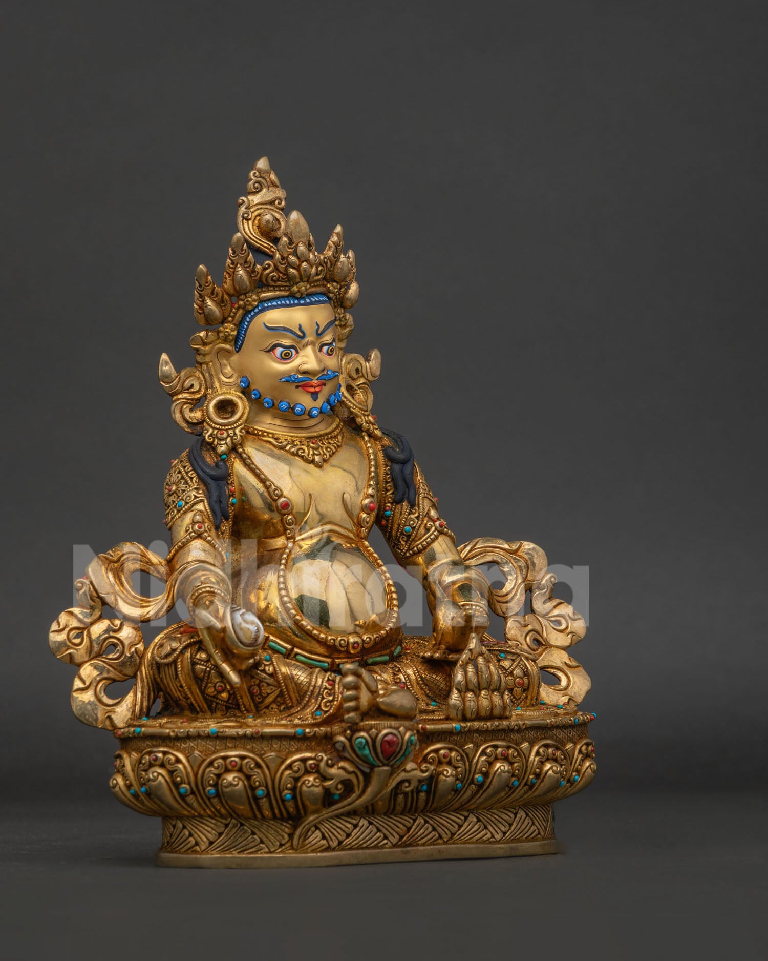 Yellow Dzambhala Statue left view side with mongoose and intricate stone embellishments