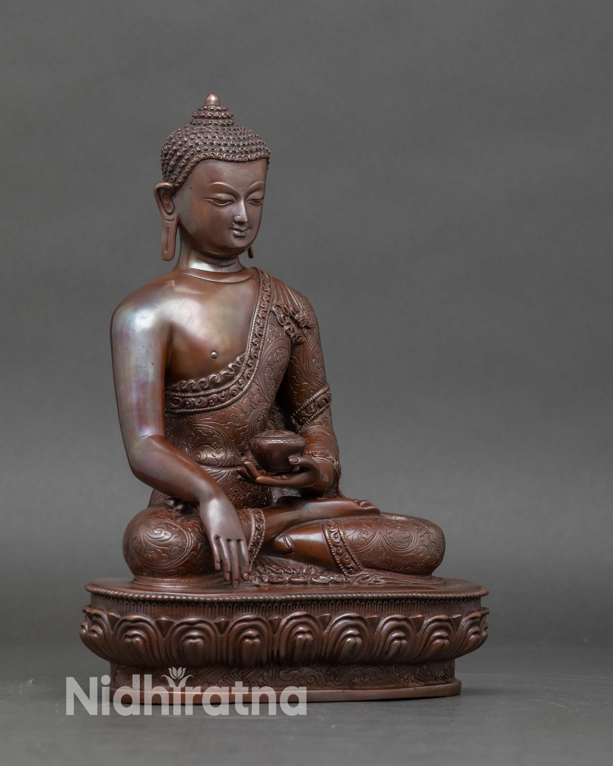 Side view of Shakyamuni Buddha sculpture on lotus base, Himalayan altar décor for meditation