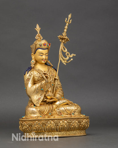 Side-view-Tsokye-Dorje-statue-vajra-right-hand-skull-cup-left-hand-khatvanga-staff