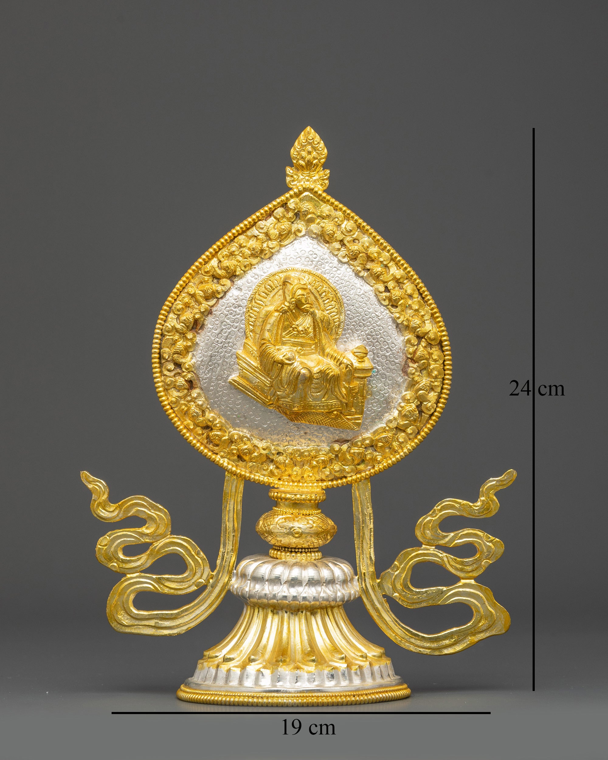 Astamangala symbols showing gold and silver plated copper Himalayan metalwork