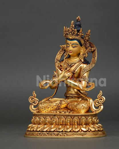 Left Side View of Gold-Gilded Vajradhara Buddha Statue on Lotus Throne