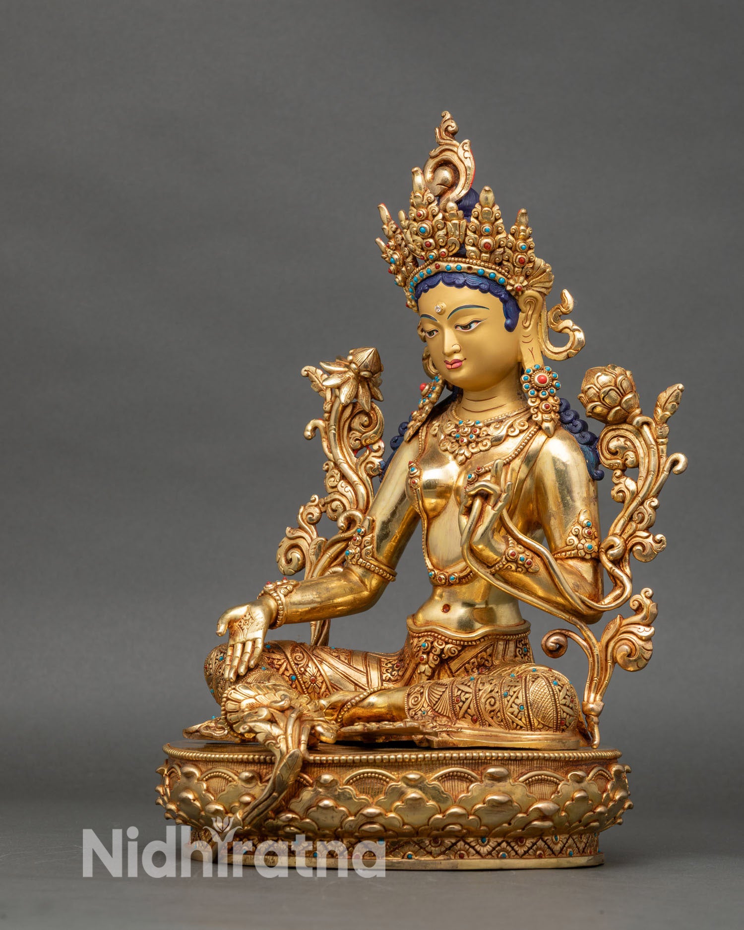 Left profile of Green Tara Drolma, lotus pedestal, detailed ornamentation