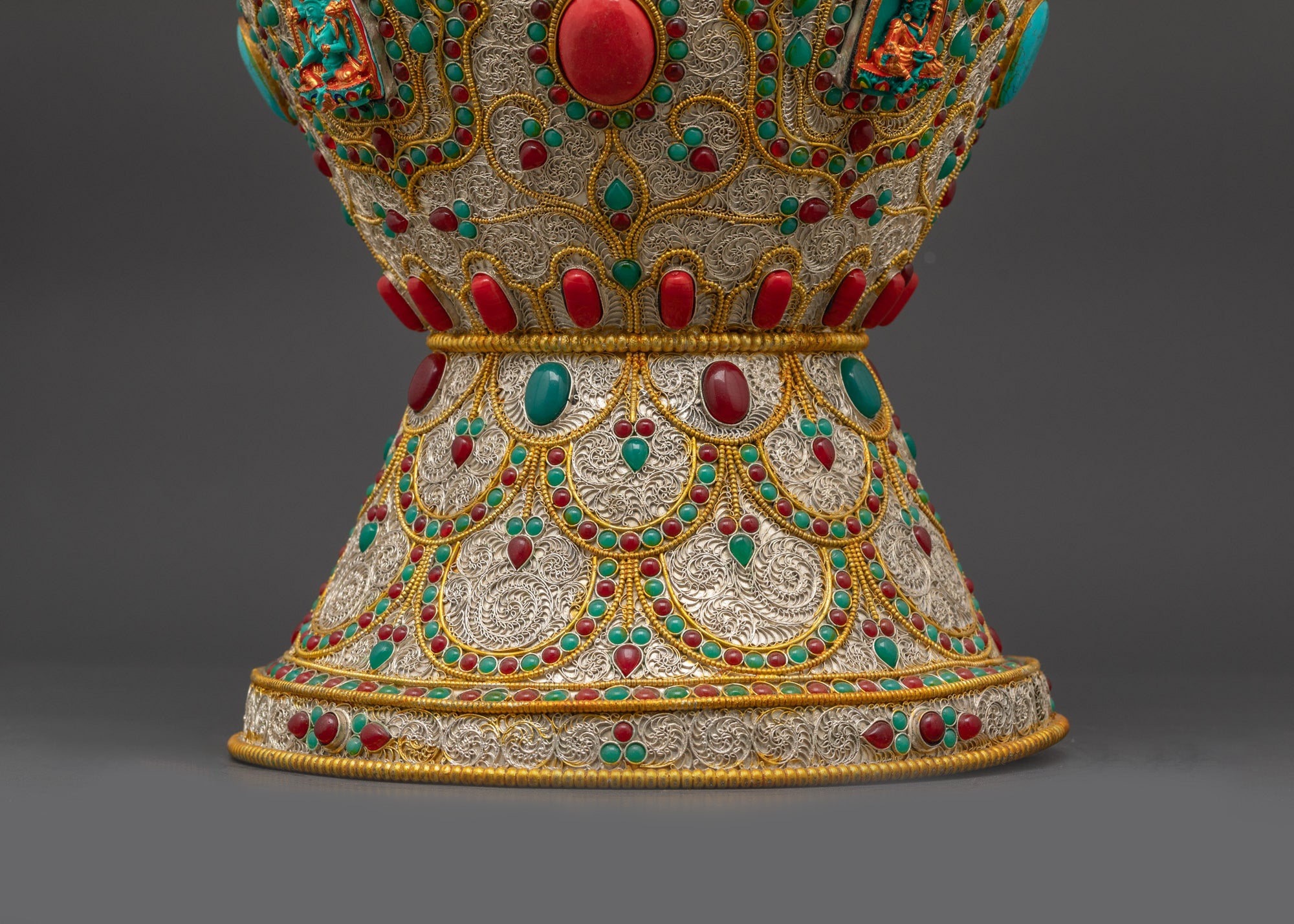 Back view of handcrafted Himalayan Flower Vase showcasing auspicious symbols and ornate gold-silver detailing made by Nepalese artisans.