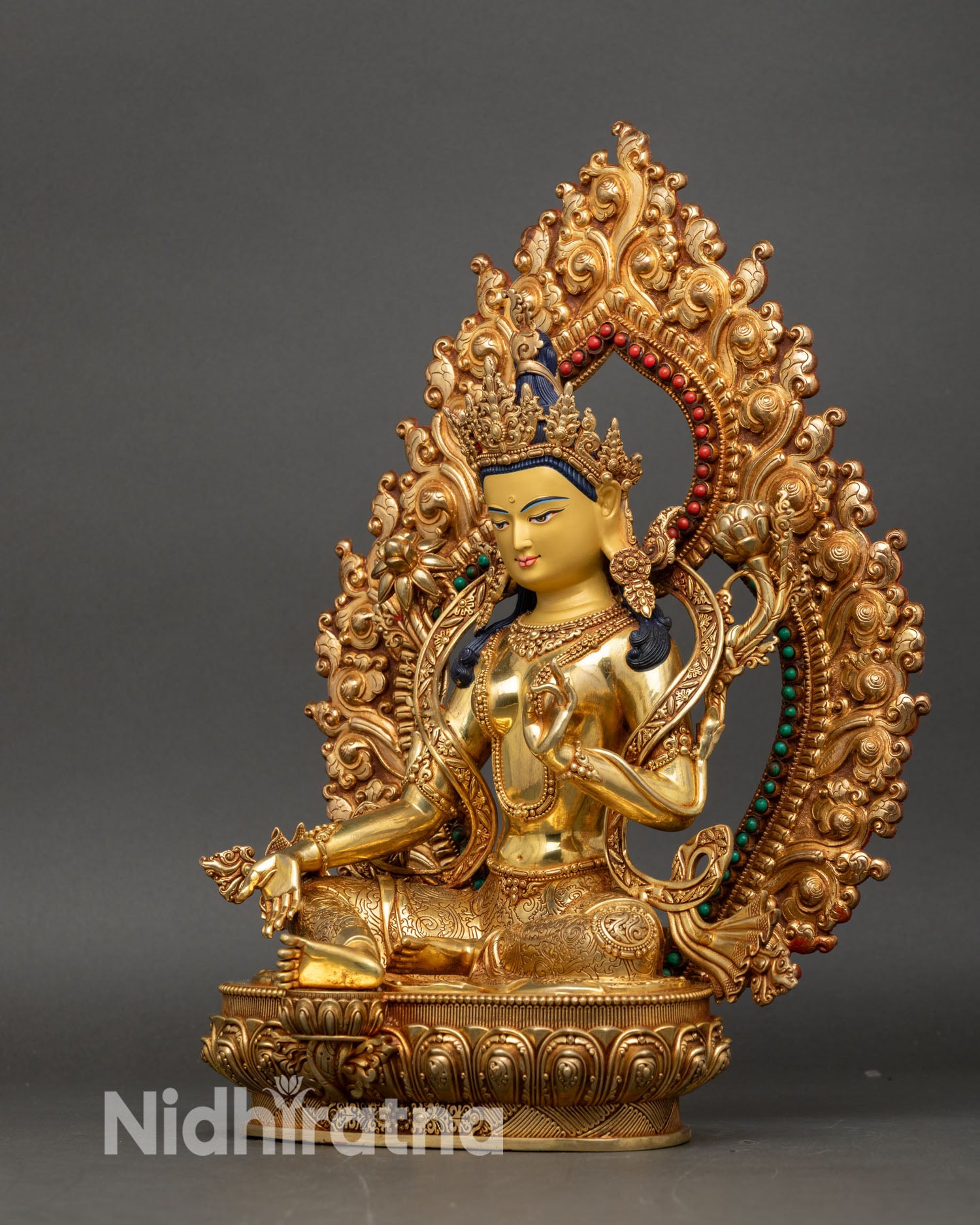 Left side view of Green Tara Statue, Nepalese Buddhist copper and gold art