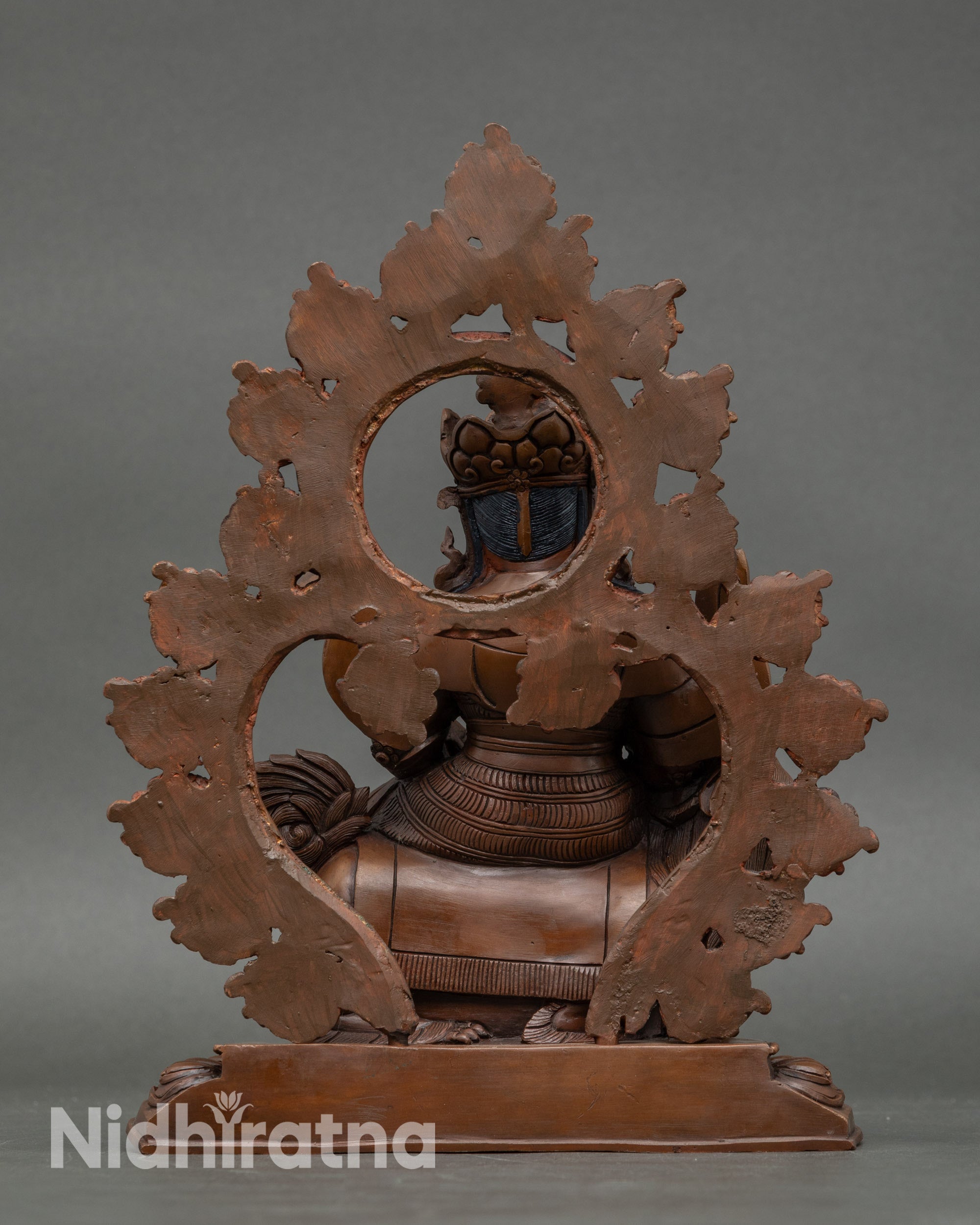 Back view Namtoshe statue on snow lion throne, meditative posture, Tibetan Buddhist décor