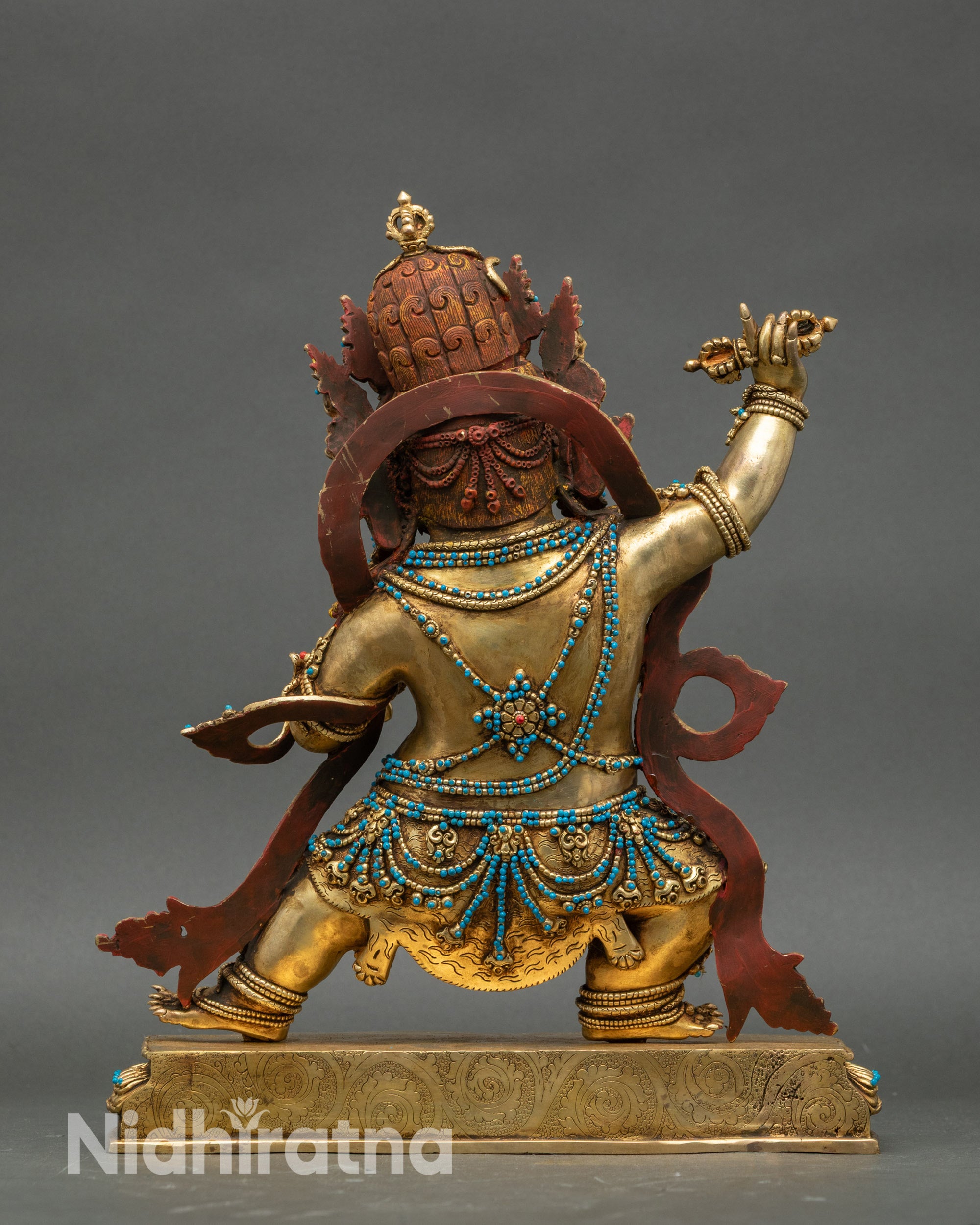 Back view of Vajrapani statue, lotus throne and traditional Nepalese craftsmanship