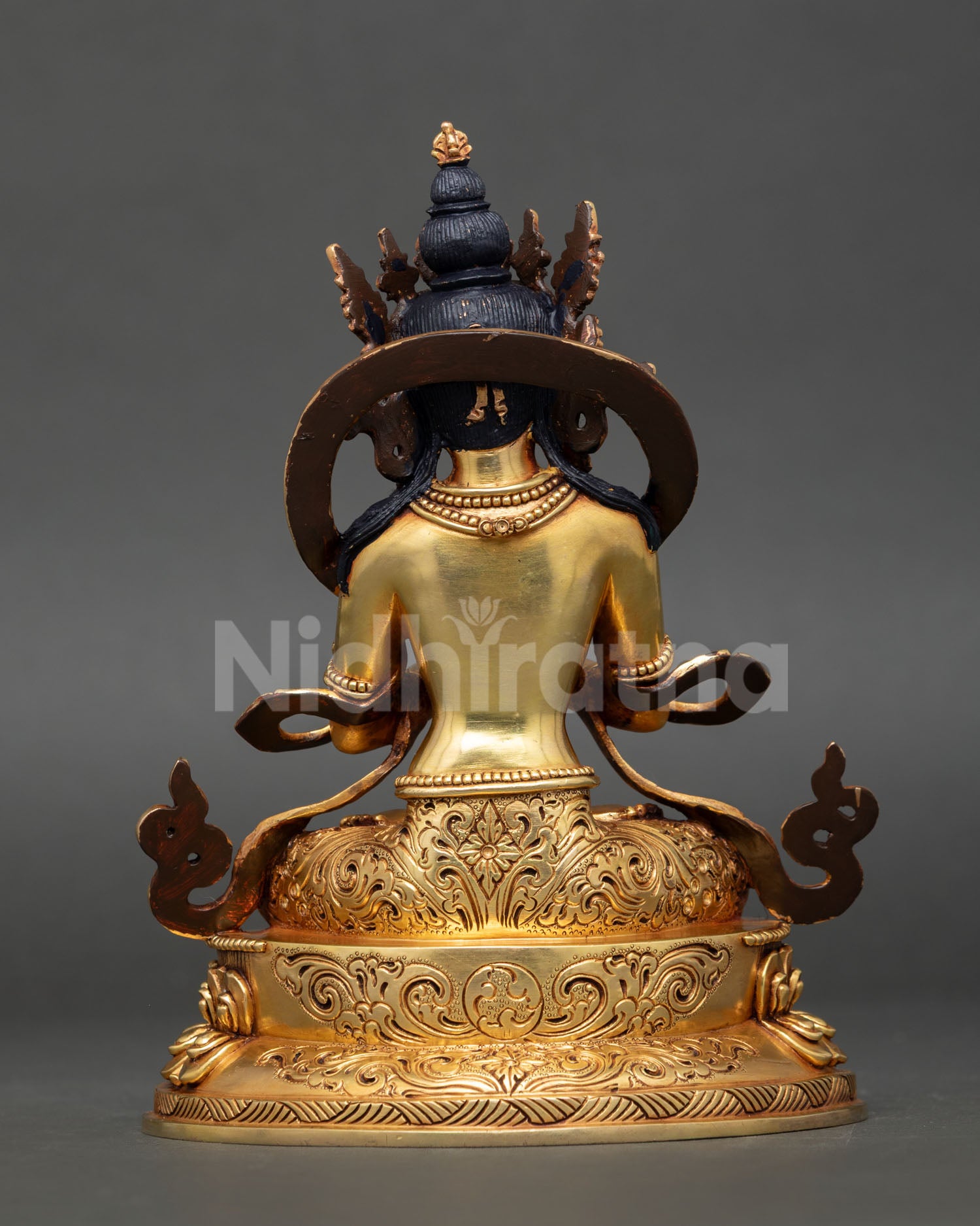 Rear View of Handmade Vajradhara Statue with Detailed Robes and Traditional Craftsmanship
