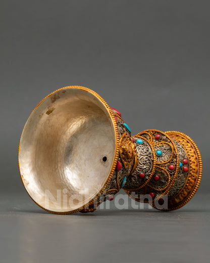 Close-up of copper butter lamp interior copper lining showing pure ritual-grade finish for clarified butter offering