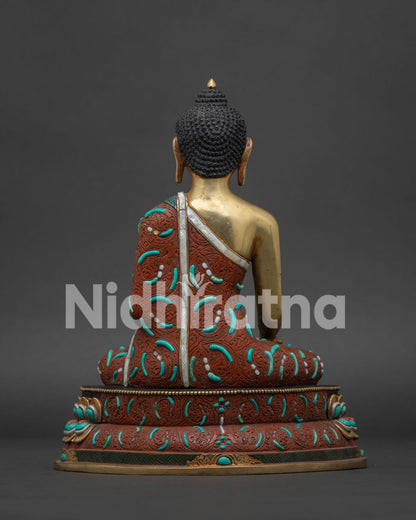 Back view of Shakyamuni Buddha copper statue with hand carved robe detailing and vajra lotus throne Nepal