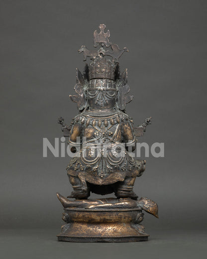 Back view of handmade Sakya Mahakala statue with detailed Nepalese artwork