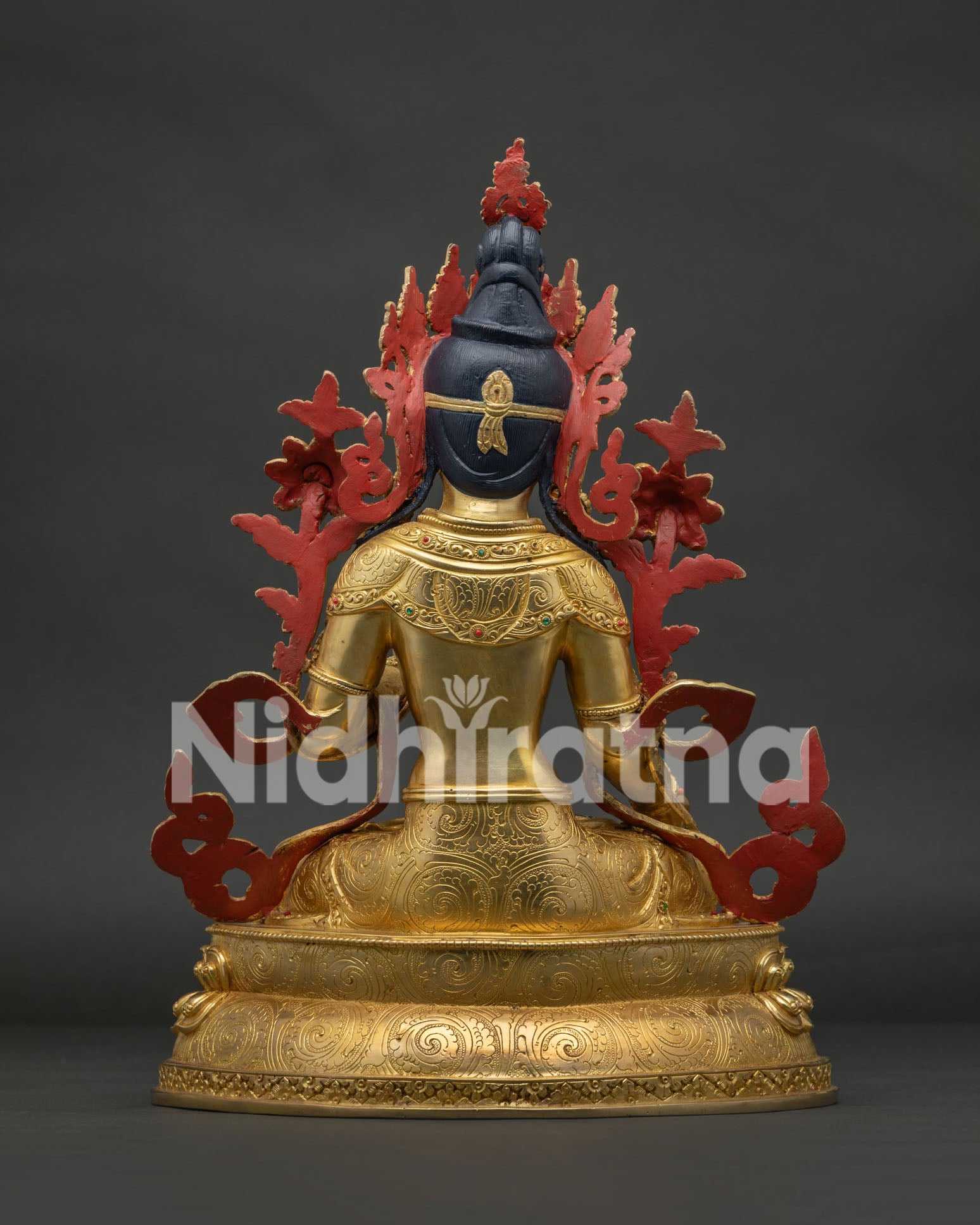 Back view of White Tara Statue showcasing detailed Himalayan metalwork