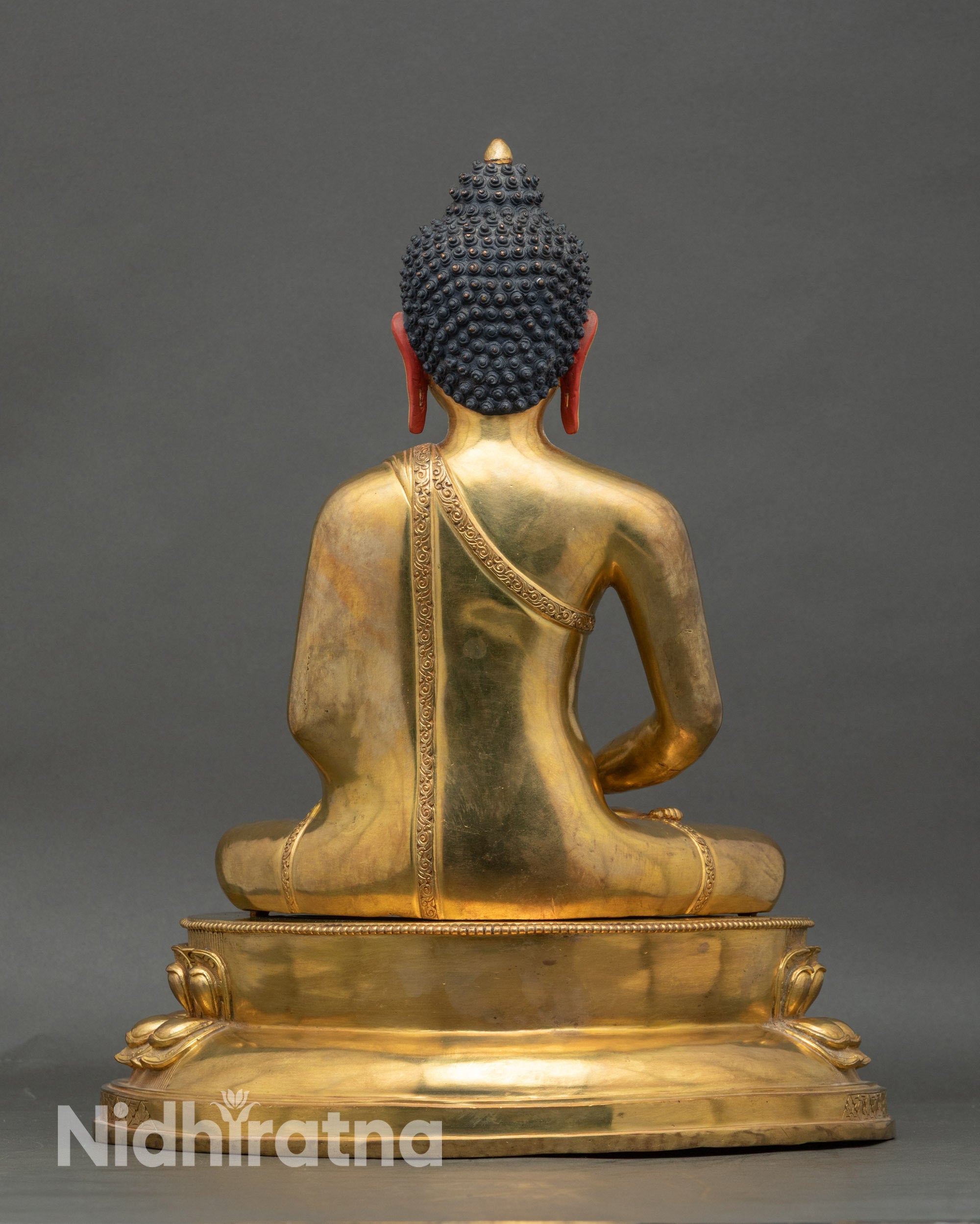 Back view Amitabha Buddha gold copper statue on lotus throne, meditation and spiritual décor