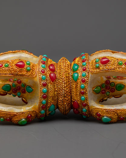 Side view Nepalese Dorje highlighting filigree design and vibrant stones