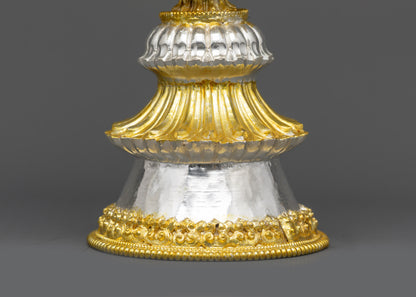 Close up of silver filigree and gold-plated Auspicious symbols on Butter Lamp Set