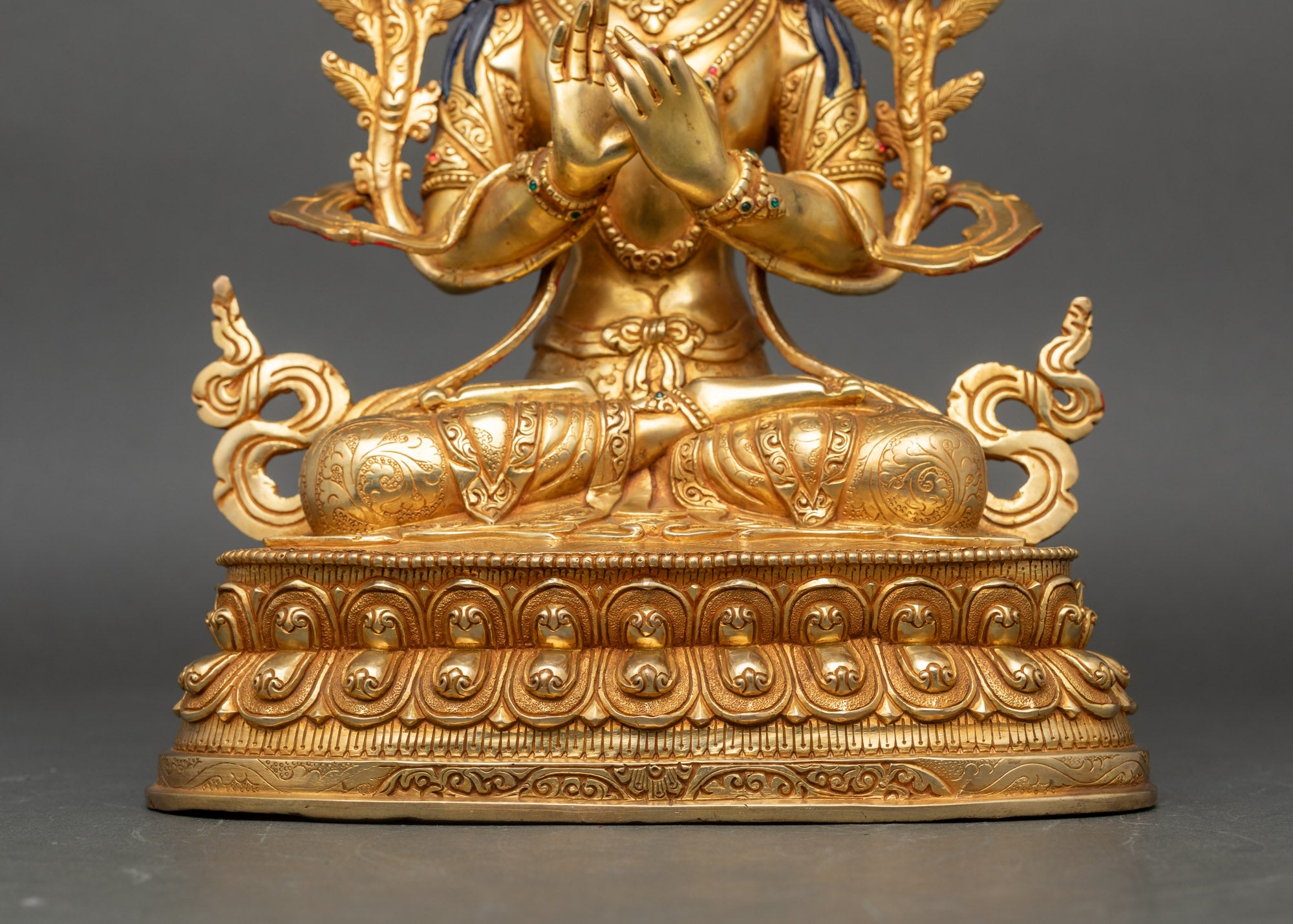 Base view Manjushri statue with engraved double lotus disc and traditional Newari artisan design