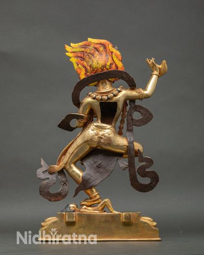 Back view Simhamukha statue showing carved robes, skull garland, and fiery halo details