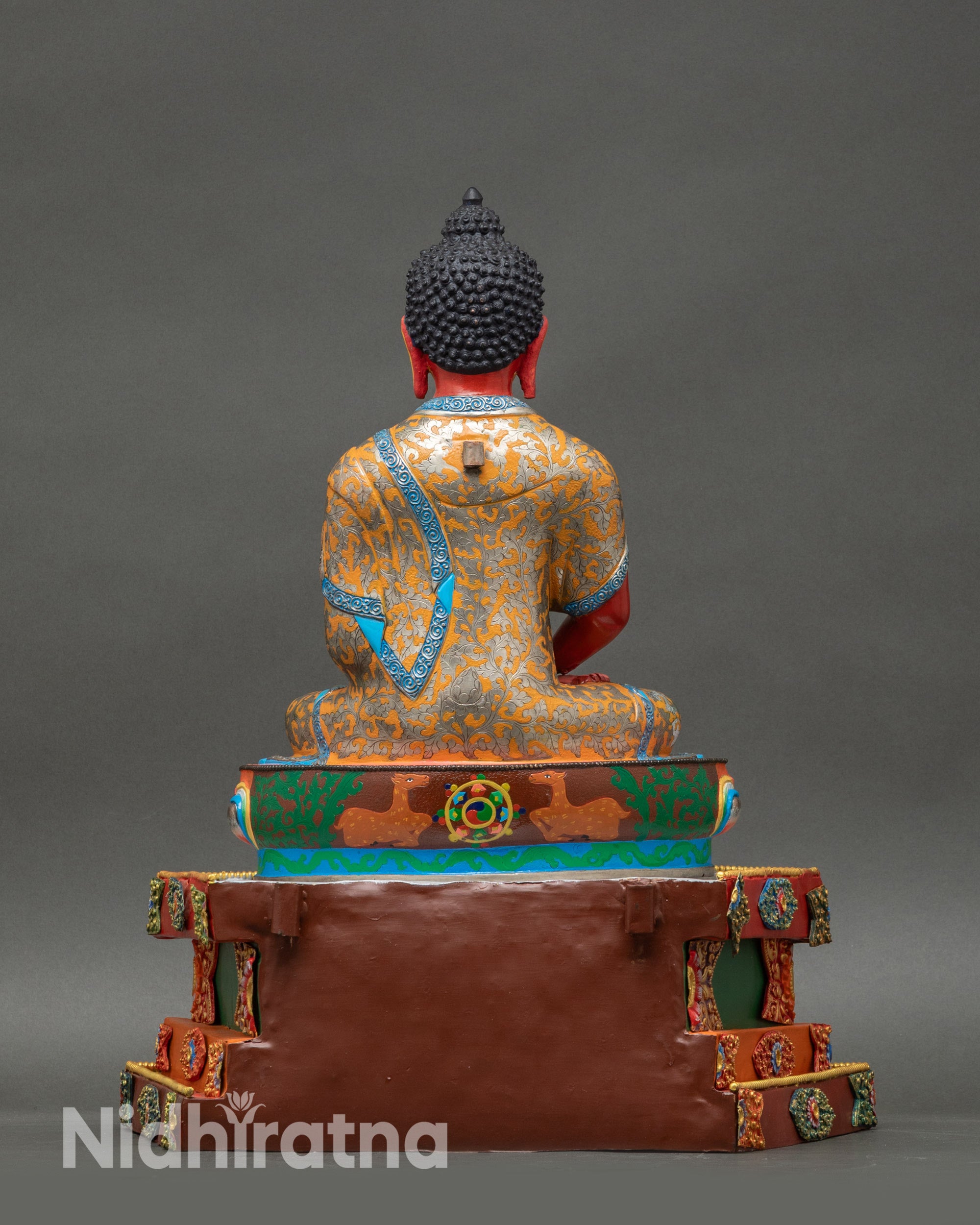 Back view Amitabha Buddha statue multi-layered base with gold detailing and carvings