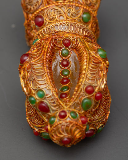 Back view Copper Dorje highlighting lotus-like ends and intricate metalwork