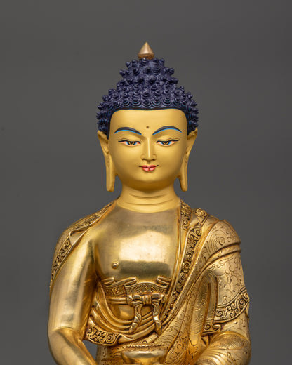 Close up Amitabha Buddha face with 24K gold-gilded details and serene expression