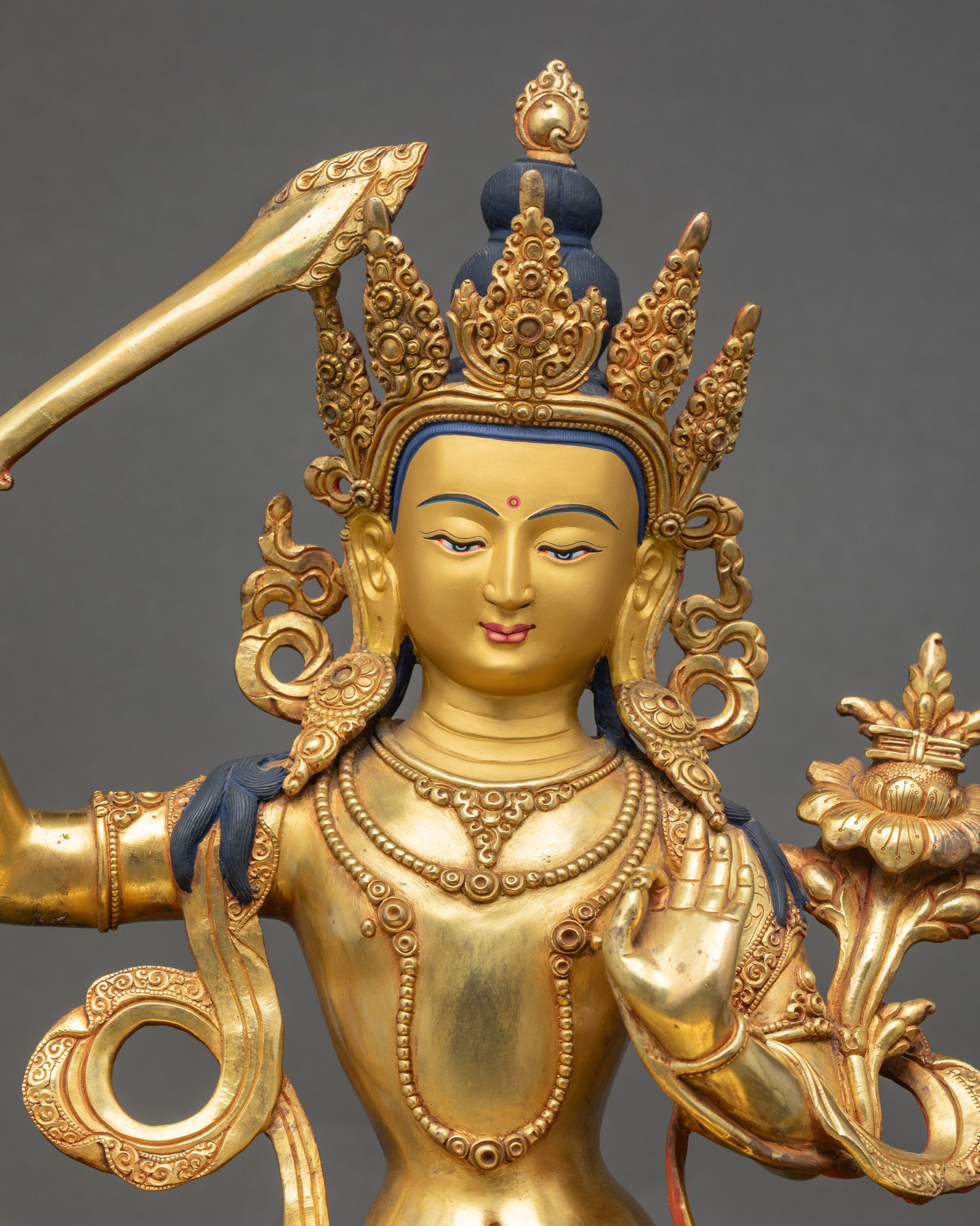 Copper Alloy Manjushri Statue with Intricate Swirling Robe Patterns