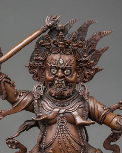 Close-up of Hayagriva statue showing horse head, staff, and lasso details, gold-painted finish