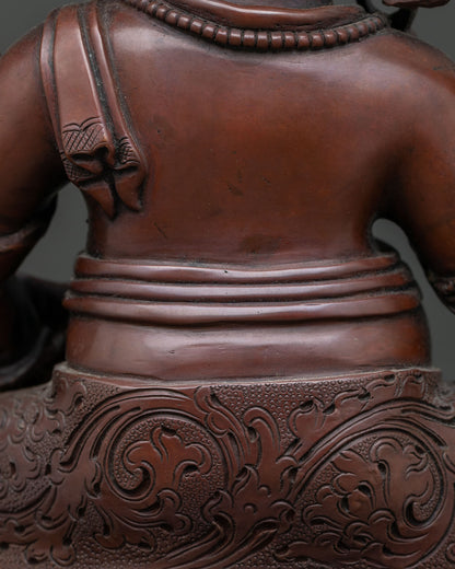 Dzambhala In Ornate Throne Statue | Brown Oxidized Copper Sculpture