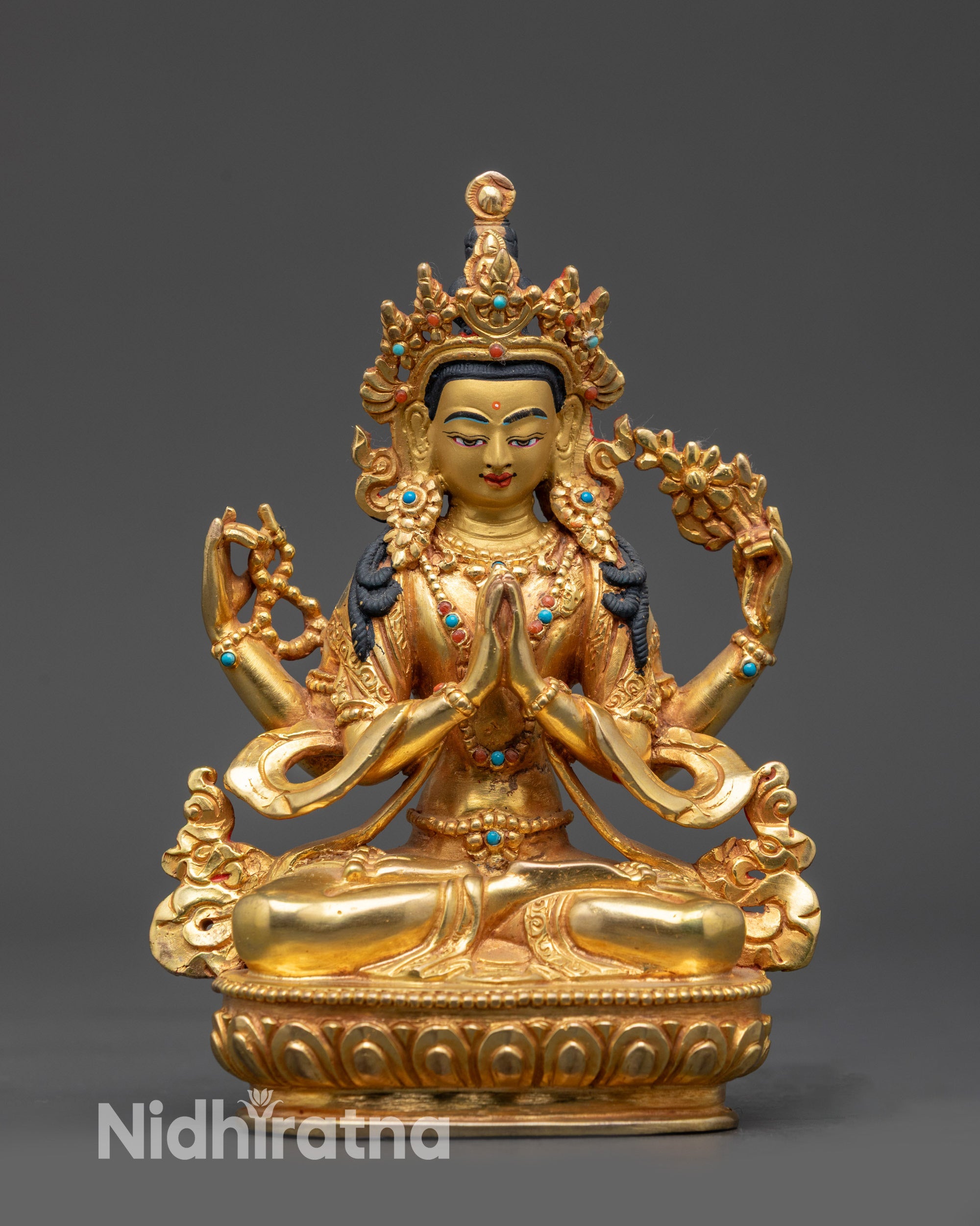 Front view Chenrezig Statue with four arms, crystal rosary, lotus, and semi-precious stones

