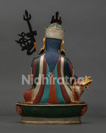 Guru Rinpoche Statue back view revealing handcrafted robes, lotus throne, and Newari metal artistry