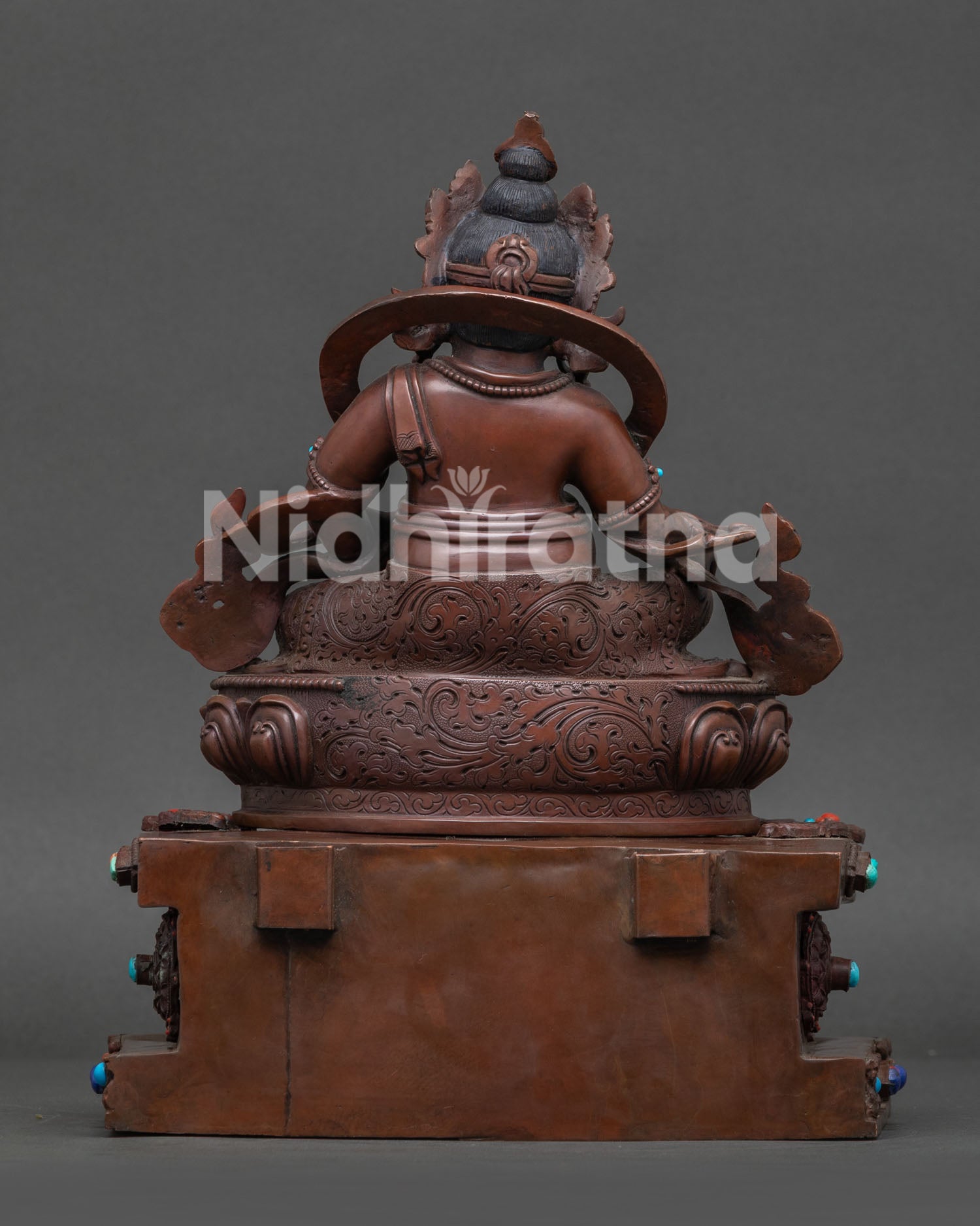 Dzambhala In Ornate Throne Statue | Brown Oxidized Copper Sculpture