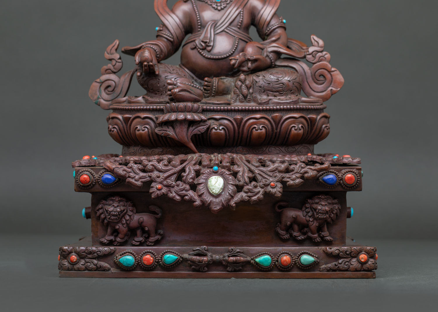 Dzambhala In Ornate Throne Statue | Brown Oxidized Copper Sculpture